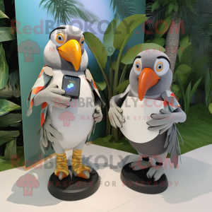 Gray Toucan mascot costume character dressed with a Wrap Dress and Smartwatches