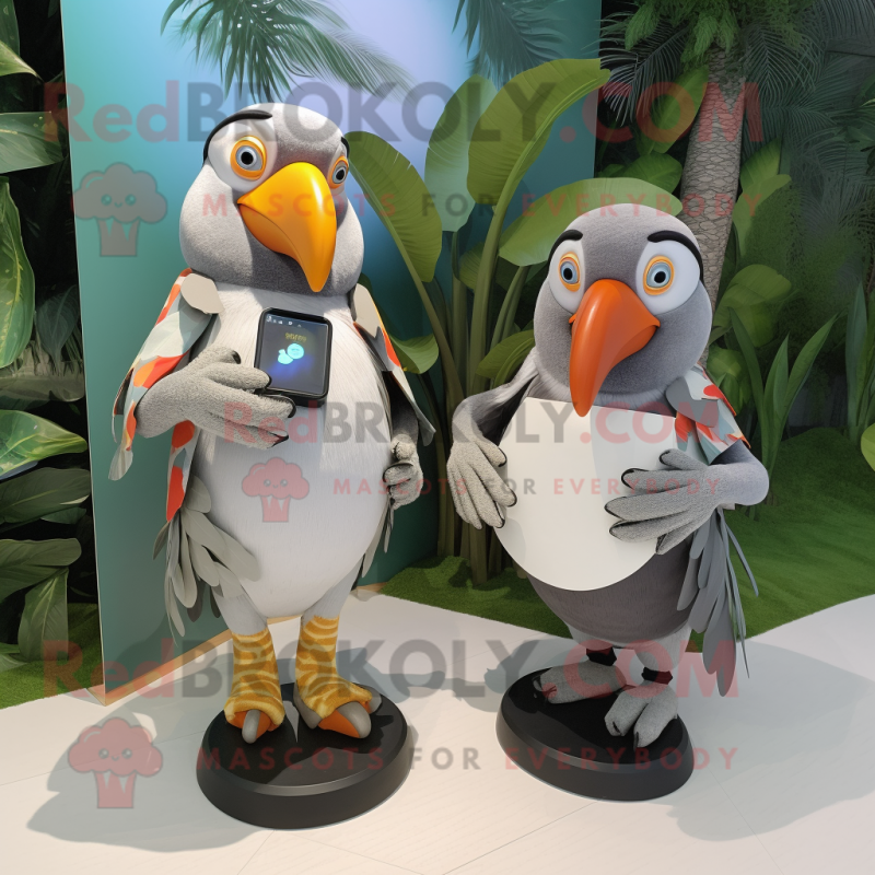 Gray Toucan mascot costume character dressed with a Wrap Dress and Smartwatches Gray Toucan mascot costume character dressed with a Wrap Dress and Smartwatches