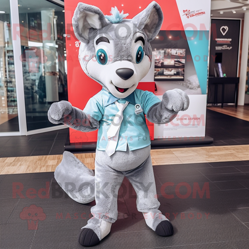 Silver Dingo mascot costume character dressed with a Yoga Pants and Bow ties Silver Dingo mascot costume character dressed with a Yoga Pants and Bow ties