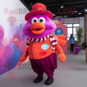 Magenta Clown Fish mascot costume character dressed with a Blouse and Hat pins