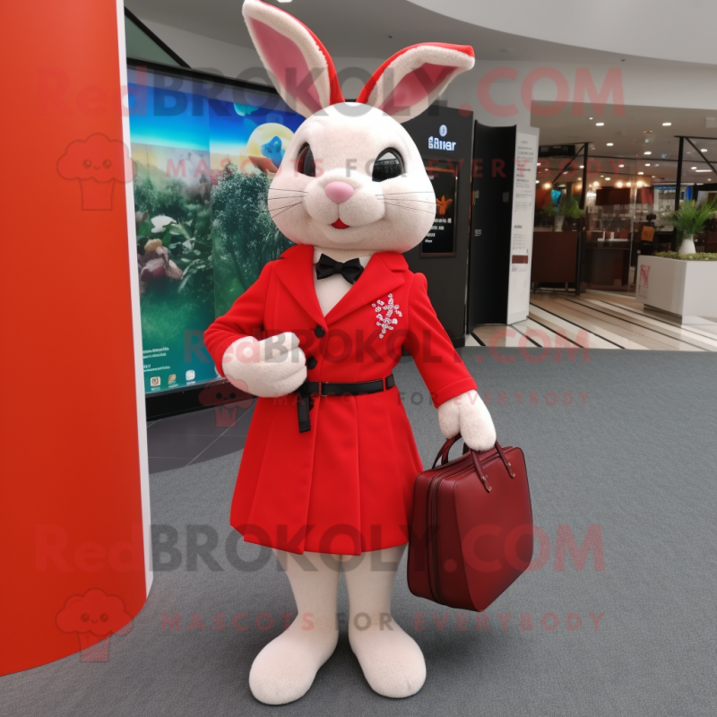 Red Rabbit mascot costume character dressed with a Blouse and Handbags