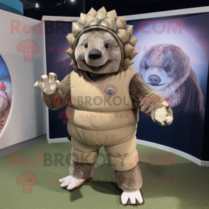 Tan Glyptodon mascot costume character dressed with a Bermuda Shorts and Gloves