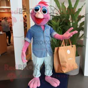 Pink Tandoori Chicken mascot costume character dressed with a Chambray Shirt and Tote bags