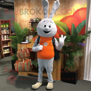 Silver Carrot mascot costume character dressed with a Flare Jeans and Briefcases