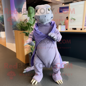 Lavender Komodo Dragon mascot costume character dressed with a Jumpsuit and Shawl pins