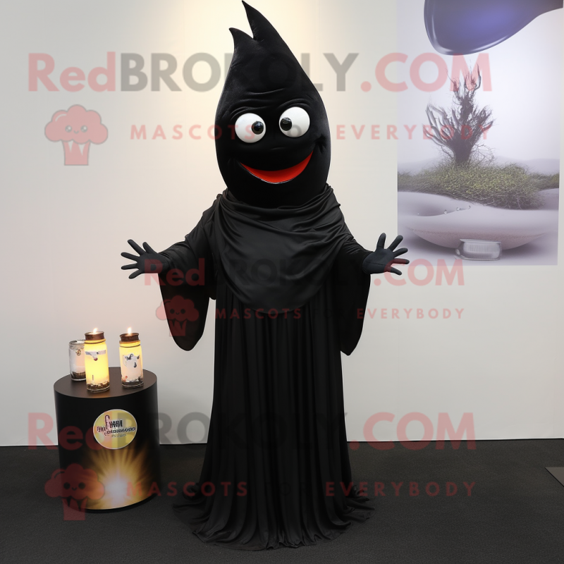 Black Scented Candle mascot costume character dressed with a Trousers and Shawl pins Black Scented Candle mascot costume character dressed with a Trousers and Shawl pins