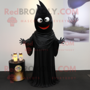 Black Scented Candle mascot costume character dressed with a Trousers and Shawl pins
