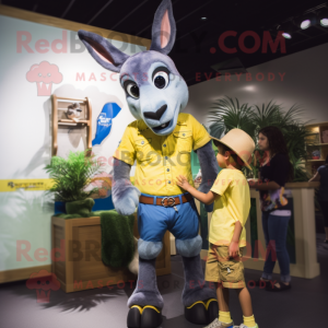 Yellow Donkey mascot costume character dressed with a Denim Shirt and Watches