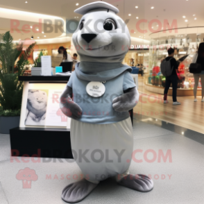 Silver Seal mascot costume character dressed with a Culottes and Clutch bags