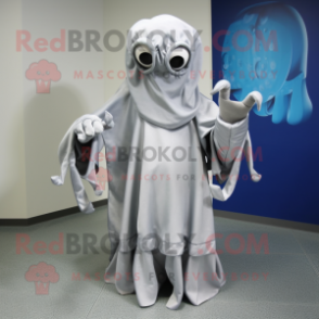 Silver Kraken mascot costume character dressed with a Cover-up and Foot pads