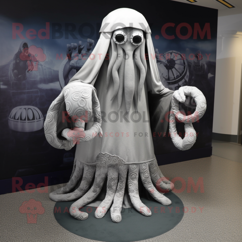 Silver Kraken mascot costume character dressed with a Cover-up and Foot pads Silver Kraken mascot costume character dressed with a Cover-up and Foot pads