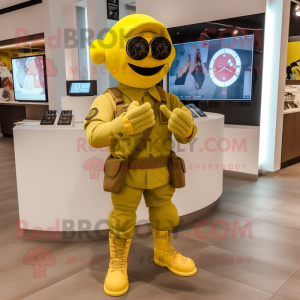 Yellow Soldier mascot costume character dressed with a Graphic Tee and Digital watches