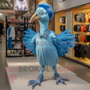 Cyan Guinea Fowl mascot costume character dressed with a Graphic Tee and Shoe clips