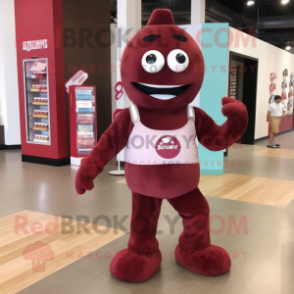 Maroon Candy mascot costume character dressed with a Chinos and Anklets