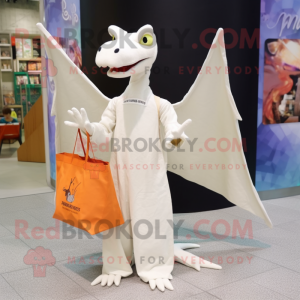 White Pterodactyl mascot costume character dressed with a Long Sleeve Tee and Tote bags