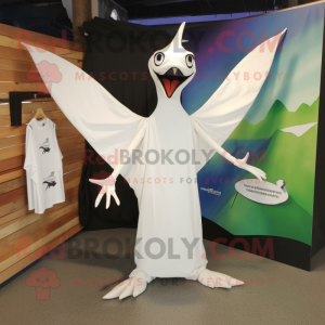 White Pterodactyl mascot costume character dressed with a Long Sleeve Tee and Tote bags