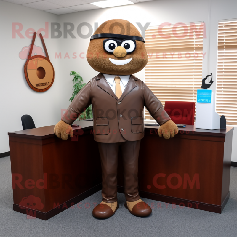 Brown Attorney mascot costume character dressed with a Suit Jacket and Keychains Brown Attorney mascot costume character dressed with a Suit Jacket and Keychains