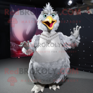 Silver Chicken mascot costume character dressed with a Ball Gown and Rings