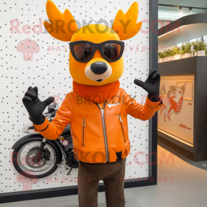 Orange Deer mascot costume character dressed with a Biker Jacket and Sunglasses