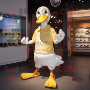 Gold Albatross mascot costume character dressed with a Henley Tee and Shoe clips