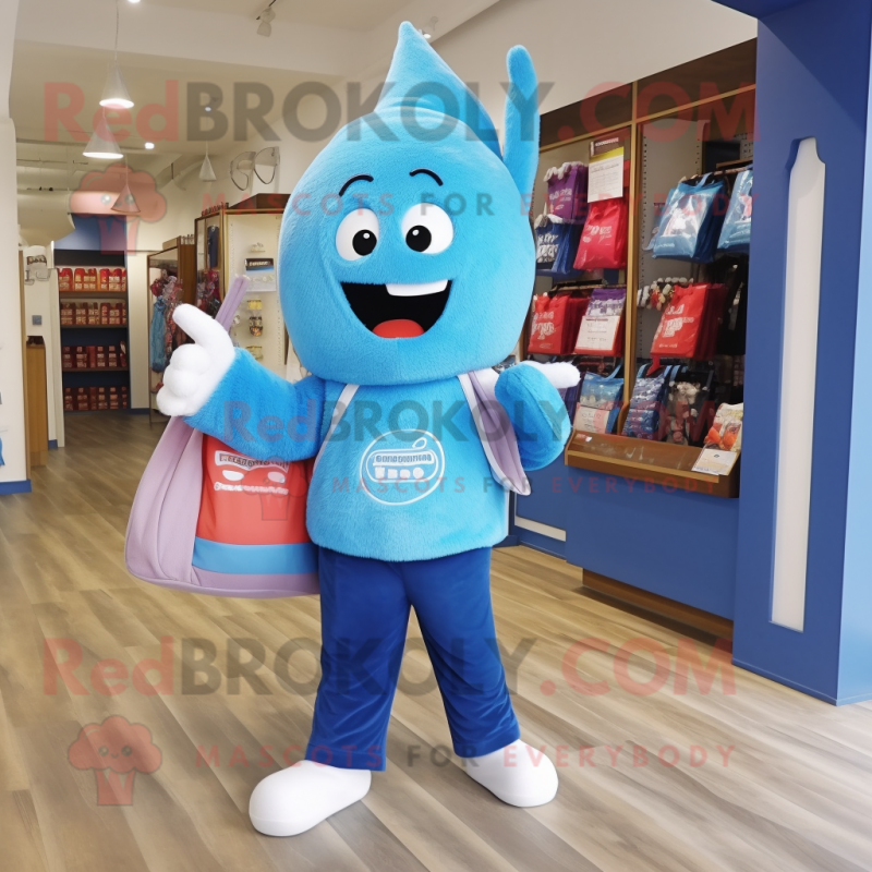 Blue Candy mascot costume character dressed with a Jeggings and Tote bags Blue Candy mascot costume character dressed with a Jeggings and Tote bags