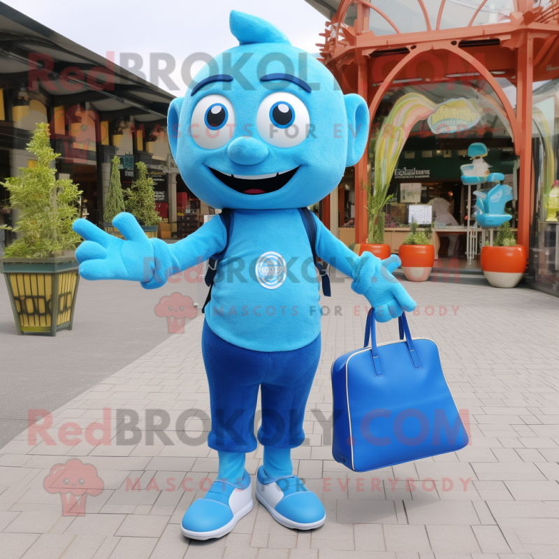 Blue Candy mascot costume character dressed with a Jeggings and Tote bags