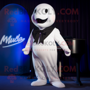 Navy Beluga Whale mascot costume character dressed with a Tuxedo and Suspenders