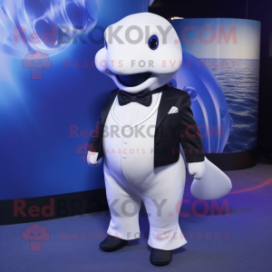 Navy Beluga Whale mascot costume character dressed with a Tuxedo and Suspenders