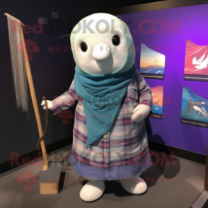 nan Narwhal mascot costume character dressed with a Flannel Shirt and Shawl pins