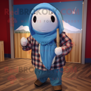 nan Narwhal mascot costume character dressed with a Flannel Shirt and Shawl pins