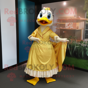 Gold Duck mascot costume character dressed with a Maxi Skirt and Wraps