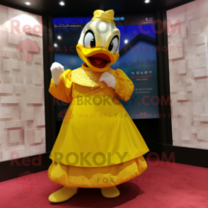 Gold Duck mascot costume character dressed with a Maxi Skirt and Wraps