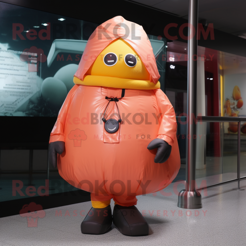 Peach Human Cannon Ball mascot costume character dressed with a Raincoat and Gloves Peach Human Cannon Ball mascot costume character dressed with a Raincoat and Gloves