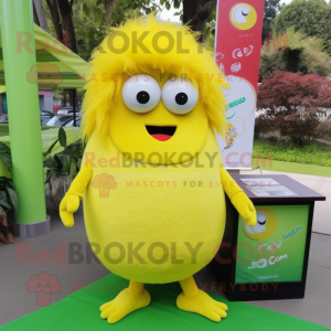 Lemon Yellow Kiwi mascot costume character dressed with a Long Sleeve Tee and Hair clips
