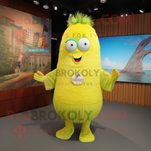 Lemon Yellow Kiwi mascot costume character dressed with a Long Sleeve Tee and Hair clips