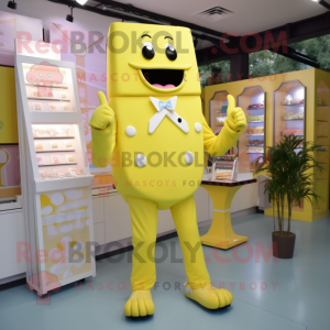 Lemon Yellow Chocolate Bars mascot costume character dressed with a Jumpsuit and Lapel pins