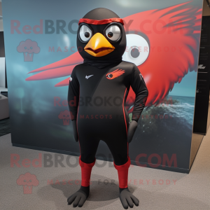 Red Blackbird mascot costume character dressed with a Rash Guard and Headbands