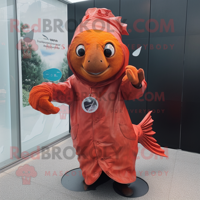 Rust Goldfish mascot costume character dressed with a Raincoat and Gloves