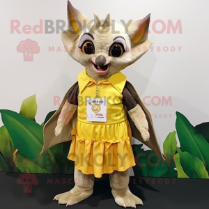 Gold Fruit Bat mascot costume character dressed with a Wrap Skirt and Suspenders