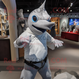 Silver Swordfish mascot costume character dressed with a V-Neck Tee and Gloves