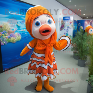 Orange Clown Fish mascot costume character dressed with a Swimwear and Shawls