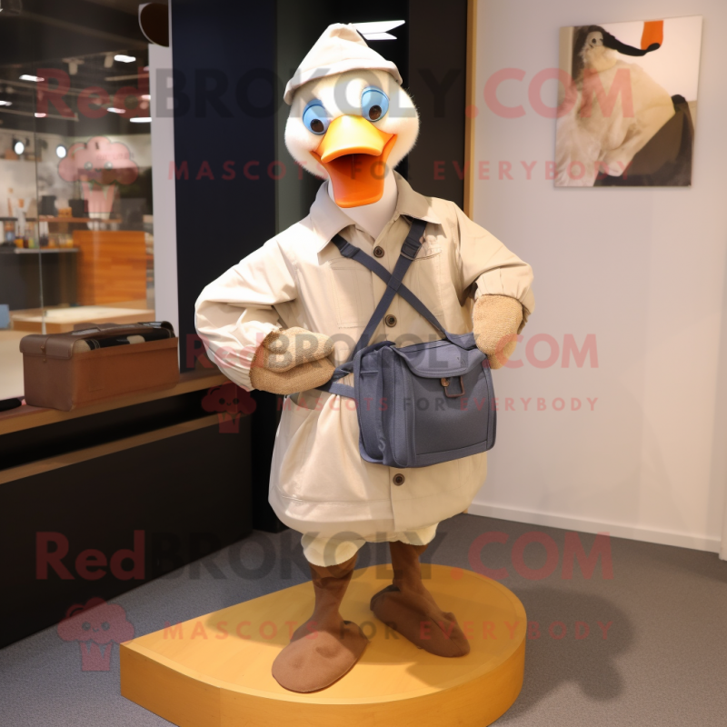 nan Goose mascot costume character dressed with a Dungarees and Messenger bags