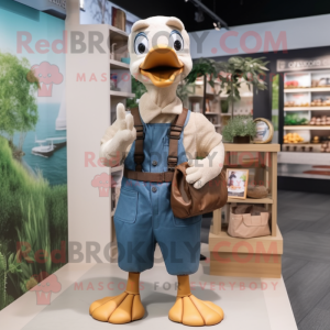 nan Goose mascot costume character dressed with a Dungarees and Messenger bags