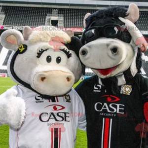 2 koeienmascottes, een witte en een zwarte - Redbrokoly.com