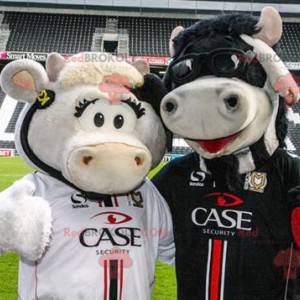 2 mascotte mucca, una bianca e una nera - Redbrokoly.com