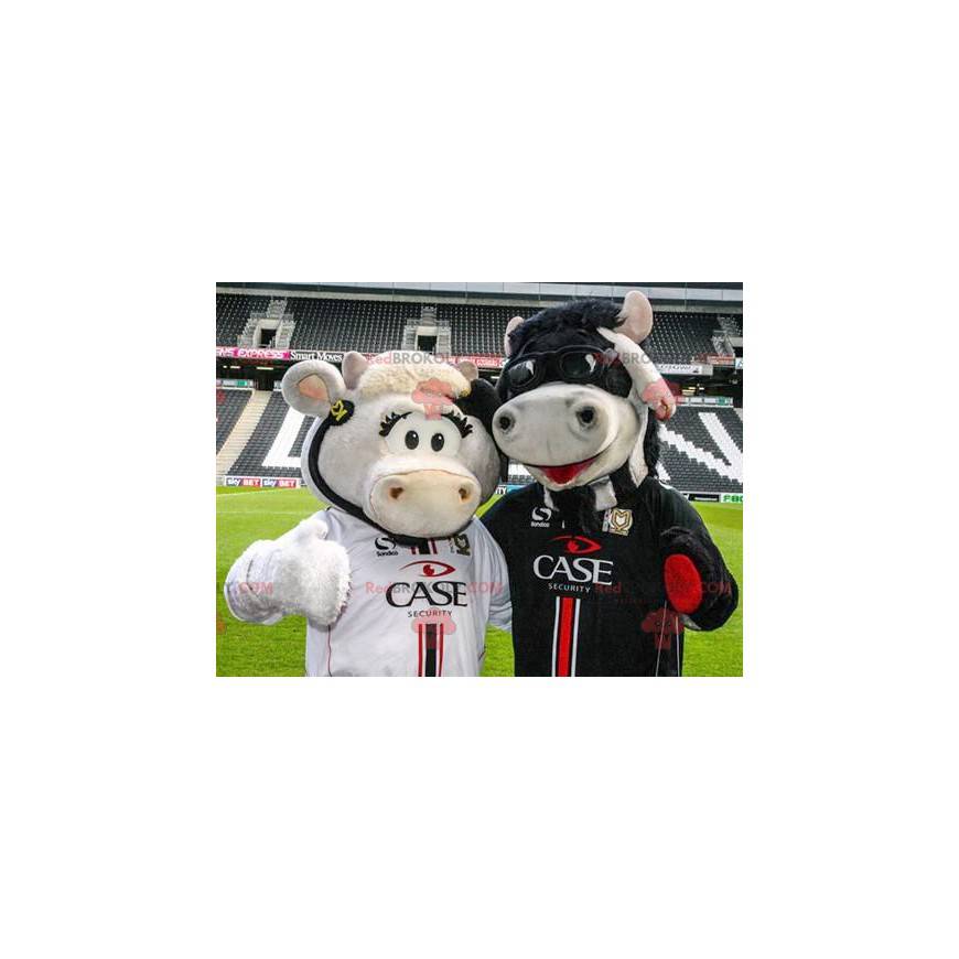 2 mascottes de vaches une blanche et une noire - Redbrokoly.com