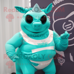 Turquoise Rhinoceros mascot costume character dressed with a Bikini and Belts