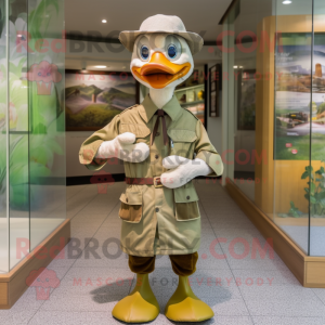 Olive Geese mascot costume character dressed with a Poplin Shirt and Hat pins