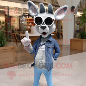 Silver Gazelle mascot costume character dressed with a Denim Shorts and Sunglasses