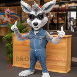 Silver Gazelle mascot costume character dressed with a Denim Shorts and Sunglasses